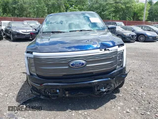 2023 Ford F-150 Lightning Pro с VIN 1FT6W1EVXPWG42428, выставлен на аукционе IAAI как лот 39711091 с пробегом 6 308 миль миль и . История ставок и продаж доступна на DreamBid. Изображение 12.
