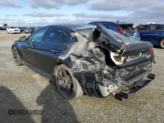 2017 BMW M6 z VIN WBS6E9C52HG437288, wystawiony jako Copart lot #38576804 z przebiegiem 25 137 mil mil oraz Tytuł czysty. Historia ofert i sprzedaży dostępna na DreamBid. Obrazek 2.