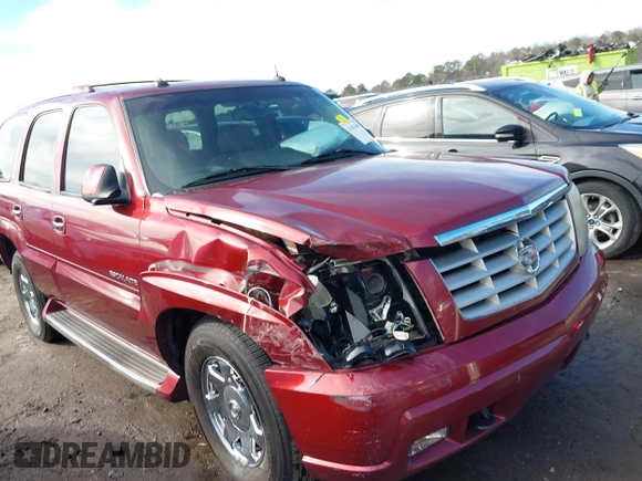 2003 Cadillac Escalade z VIN 1GYEC63T53R146068, wystawiony jako IAAI lot #41634405 z przebiegiem 272 263 mil mil oraz . Historia ofert i sprzedaży dostępna na DreamBid. Obrazek 6.