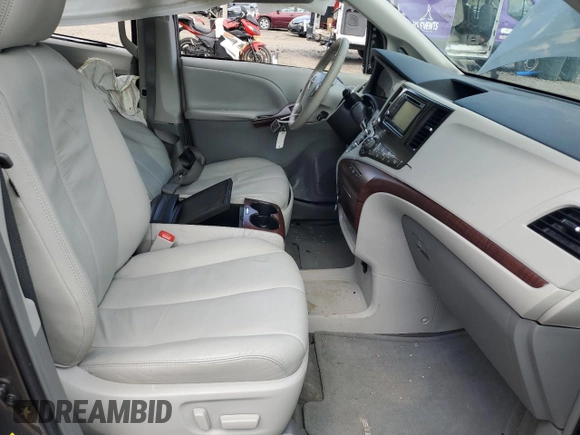 2012 Toyota Sienna XLE AAS with VIN 5TDYK3DC6CS248919, listed as a Copart auction lot 55470505 with 79,761 mi miles and Salvage title. Bid and sale history available at DreamBid. Image 7.
