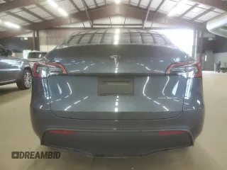 2023 Tesla Model Y Long Range z VIN 7SAYGDEE6PA179733, wystawiony jako Copart lot #58399015 z przebiegiem 45 780 mil mil oraz Szkoda całkowita • Salvage title. Historia ofert i sprzedaży dostępna na DreamBid. Obrazek 6.