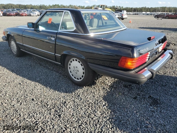 1989 Mercedes-Benz 560 Series 560SL with VIN WDBBA48D8KA101576, listed as a Copart auction lot 75503004 with 68,911 mi miles and Salvage Title. Bid and sale history available at carsss.com. Image 2.