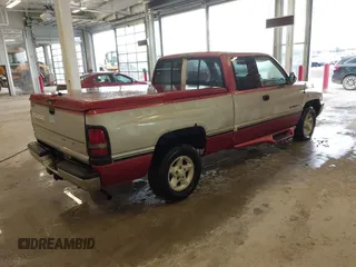 1997 Dodge 1500 with VIN 3B7HC13ZXVG772664, listed as a IAAI auction lot 41648778 with 144,047 mi miles and . Bid and sale history available at DreamBid. Image 4.