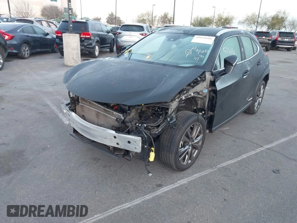 2021 Lexus UX with VIN JTHE9JBH5M2054228, listed as a IAAI auction lot 41651686 with 35,955 mi miles. Bid and sale history available at carsss.com. Image 2.