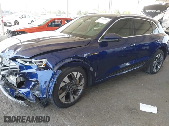 2021 Audi e-tron Premium Plus with VIN WA1LAAGE4MB038563, listed as a IAAI auction lot 42422063 with 31,645 mi miles and . Bid and sale history available at DreamBid. Image 18.