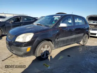 2009 Kia Rio LX with VIN KNADE243796516902, listed as a Copart auction lot 86567394 with 304,684 mi miles and Salvage Title. Bid and sale history available at carsss.com. Image 1.