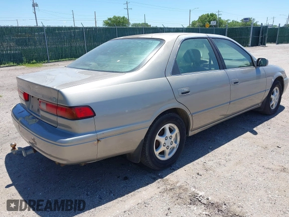 1997 Toyota Camry LE z VIN 4T1BG22K4VU063869, wystawiony jako IAAI lot #42274011 z przebiegiem Nie podano mil oraz . Historia ofert i sprzedaży dostępna na DreamBid. Obrazek 4.