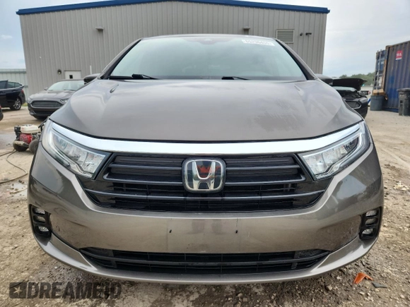 2022 Honda Odyssey Touring z VIN 5FNRL6H89NB020462, wystawiony jako Copart lot #65296455 z przebiegiem 52 058 mil mil oraz Szkoda całkowita • Salvage title. Historia ofert i sprzedaży dostępna na DreamBid. Obrazek 5.