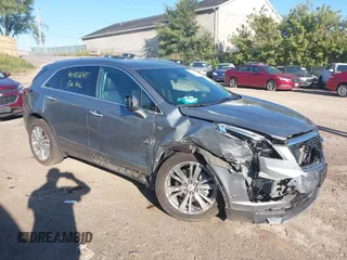 2023 Cadillac XT5 AWD Premium Luxury with VIN 1GYKNDRSXPZ150235, listed as a IAAI auction lot 40412645 with 22,072 mi miles and . Bid and sale history available at DreamBid. Image 1.