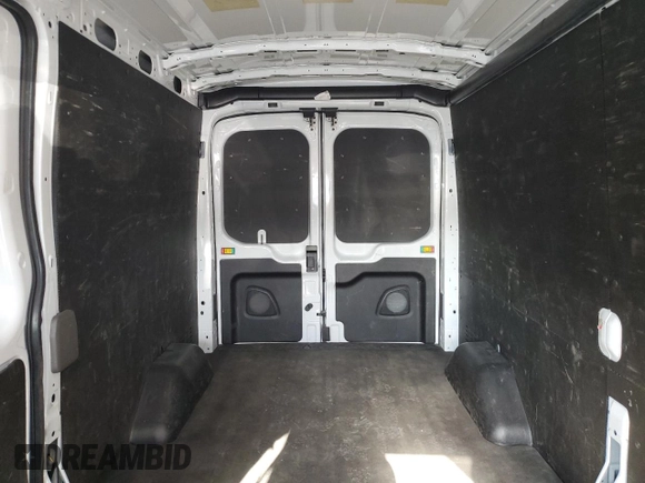 2023 Ford Transit Cargo z VIN 1FTBR2C8XPKC00992, wystawiony jako Copart lot #73199944 z przebiegiem 31 891 mil mil oraz Czysty tytuł • Clean title. Historia ofert i sprzedaży dostępna na DreamBid. Obrazek 10.