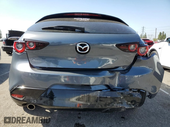2022 Mazda 3 Premium with VIN JM1BPAML8N1511424, listed as a Copart auction lot 57108135 with 52,791 mi miles and Salvage title. Bid and sale history available at DreamBid. Image 6.