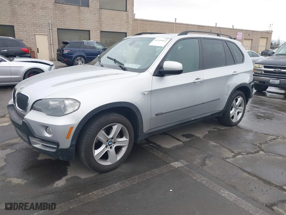 2007 BMW X5 3.0si with VIN 5UXFE43597L017476, listed as a IAAI auction lot 41459147 with 184,494 mi miles. Bid and sale history available at carsss.com. Image 18.