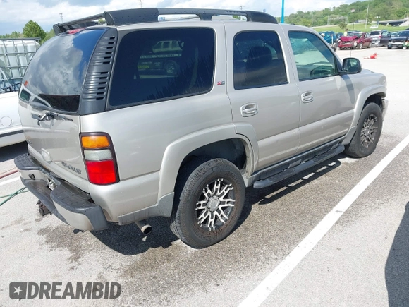 2005 Chevrolet Tahoe LT z VIN 1GNEK13T35R196103, wystawiony jako IAAI lot #42053184 z przebiegiem 326 536 mil mil oraz . Historia ofert i sprzedaży dostępna na DreamBid. Obrazek 4.