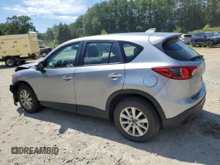 2015 Mazda CX-5 Sport with VIN JM3KE4BE3F0433211, listed as a Copart auction lot 62718415 with 161,430 mi miles and Clean title. Bid and sale history available at DreamBid. Image 2.