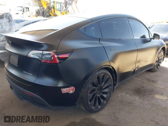 2022 Tesla Model Y Performance z VIN 7SAYGDEF0NF491586, wystawiony jako IAAI lot #42276747 z przebiegiem 117 203 mil mil oraz . Historia ofert i sprzedaży dostępna na DreamBid. Obrazek 4.