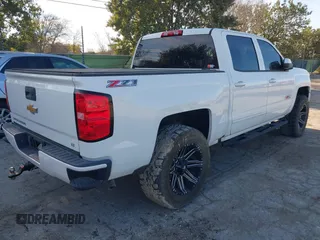 2017 Chevrolet Silverado 1500 LT with VIN 3GCUKREC4HG466329, listed as a IAAI auction lot 41305052 with 57,844 mi miles and . Bid and sale history available at DreamBid. Image 4.