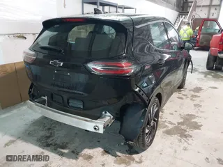 2023 Chevrolet Bolt EV 2LT with VIN 1G1FX6S03P4184237, listed as a IAAI auction lot 41565141 with 80,603 mi miles. Bid and sale history available at carsss.com. Image 4.