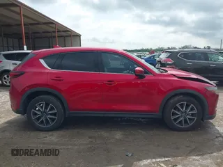 2018 Mazda CX-5 Grand Touring with VIN JM3KFADM7J1357401, listed as a IAAI auction lot 42106012 with 119,420 mi miles and . Bid and sale history available at DreamBid. Image 13.