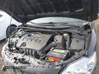 2009 Toyota Corolla with VIN 2T1BU40E29C124161, listed as a IAAI auction lot 41091324 with 128,310 mi miles. Bid and sale history available at carsss.com. Image 10.