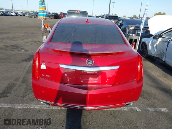 2013 Cadillac XTS Luxury with VIN 2G61P5S3XD9115546, listed as a IAAI auction lot 41980135 with 104,609 mi miles and . Bid and sale history available at DreamBid. Image 16.
