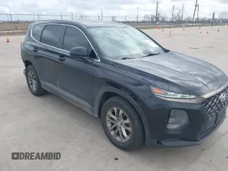 2019 Hyundai Santa Fe SE with VIN 5NMS23AD1KH074388, listed as a IAAI auction lot 41539007 with 123,570 mi miles. Bid and sale history available at carsss.com. Image 1.