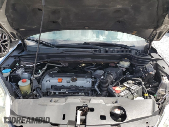 2010 Honda CR-V LX with VIN 5J6RE4H34AL057648, listed as a Copart auction lot 62679515 with 103,047 mi miles and Salvage title. Bid and sale history available at DreamBid. Image 12.