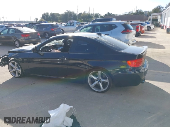 2012 BMW 3 Series 335i with VIN WBAKG7C50CE803402, listed as a IAAI auction lot 41531322 with 111,375 mi miles and . Bid and sale history available at DreamBid. Image 15.