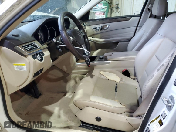 2014 Mercedes-Benz E 400 Sport with VIN WDDHF9FBXEA936424, listed as a Copart auction lot 83331224 with 194,689 mi miles and Salvage Title. Bid and sale history available at DreamBid. Image 7.