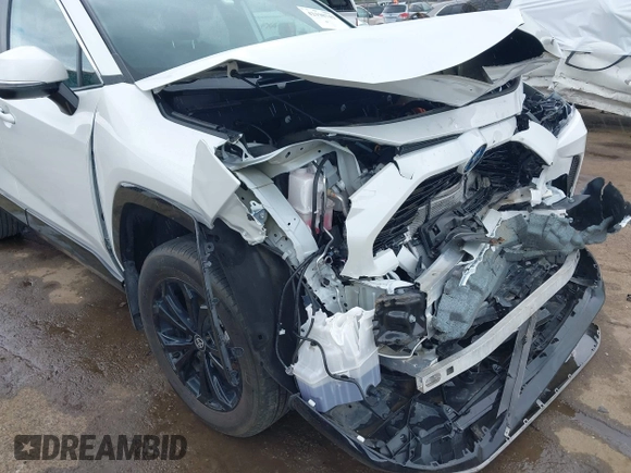 2024 Toyota RAV4 Hybrid SE with VIN 2T3T6RFV3RW066117, listed as a IAAI auction lot 42198742 with 12,352 mi miles and . Bid and sale history available at DreamBid. Image 18.