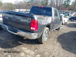 2016 Ram 1500 Lone Star with VIN 1C6RR6LTXGS269635, listed as a IAAI auction lot 41203227 with 157,077 mi miles. Bid and sale history available at carsss.com. Image 4.