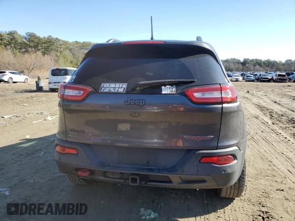 2018 Jeep Cherokee Trailhawk with VIN 1C4PJMBB9JD548008, listed as a Copart auction lot 43076075 with 61,906 mi miles and Salvage title. Bid and sale history available at DreamBid. Image 6.