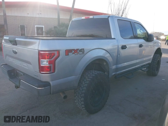 2019 Ford F-150 XL with VIN 1FTEW1E43KKE23264, listed as a IAAI auction lot 41395865 with 106,898 mi miles. Bid and sale history available at carsss.com. Image 4.