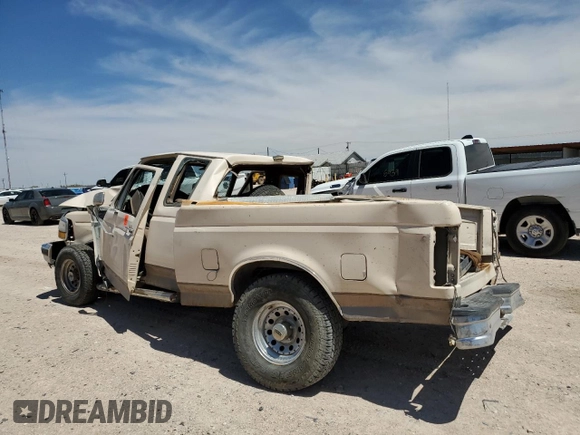 1992 Ford F-150 with VIN 1FTEX15N3NKA00727, listed as a Copart auction lot 57169714 with Not Provided miles and Salvage Title. Bid and sale history available at carsss.com. Image 2.