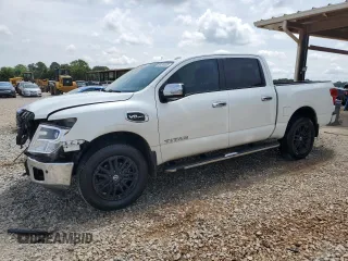 2017 Nissan Titan Platinum Reserve с VIN 1N6AA1E50HN538155, выставлен на аукционе Copart как лот 56484565 с пробегом 74 071 миль миль и Списание • Salvage title. История ставок и продаж доступна на DreamBid. Изображение 1.