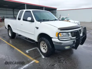 1999 Ford F-150 XL with VIN 1FTRX18L3XNA50864, listed as a IAAI auction lot 42611054 with 244,419 mi miles and . Bid and sale history available at DreamBid. Image 1.