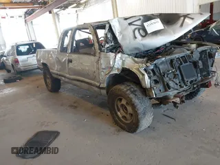 1994 GMC Sierra 1500 z VIN 2GTEK19K6R1571262, wystawiony jako IAAI lot #42183695 z przebiegiem 198 872 mil mil oraz . Historia ofert i sprzedaży dostępna na DreamBid. Obrazek 1.