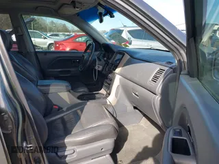 2007 Honda Pilot EX-L with VIN 5FNYF28737B001928, listed as a IAAI auction lot 41311134 with 243,870 mi miles. Bid and sale history available at carsss.com. Image 5.