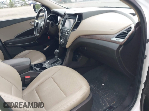 2018 Hyundai Santa Fe 2.4L z VIN 5XYZUDLB1JG543837, wystawiony jako IAAI lot #42235471 z przebiegiem 157 909 mil mil oraz . Historia ofert i sprzedaży dostępna na DreamBid. Obrazek 5.