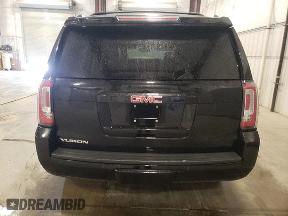 2019 GMC Yukon SLT with VIN 1GKS2BKC2KR238408, listed as a Copart auction lot 54893895 with 69,949 mi miles and Salvage Title. Bid and sale history available at DreamBid. Image 6.