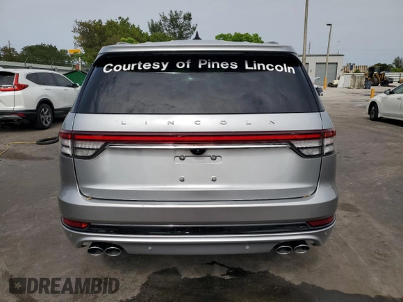 2023 Lincoln Aviator Reserve z VIN 5LM5J7WCXPGL20322, wystawiony jako Copart lot #58003605 z przebiegiem 14 563 mil mil oraz Szkoda całkowita • Salvage title. Historia ofert i sprzedaży dostępna na DreamBid. Obrazek 6.