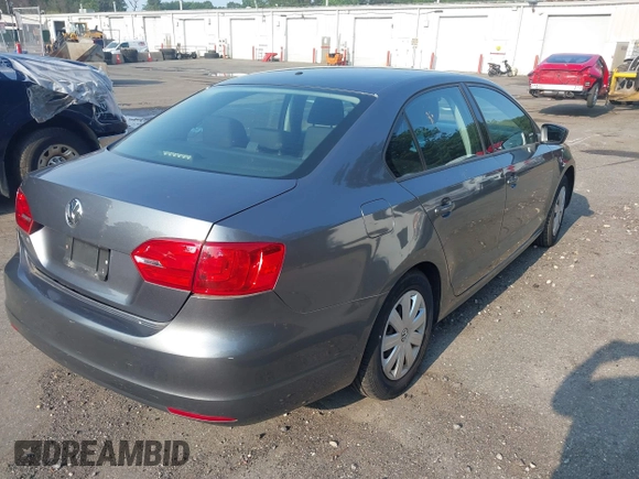 2013 Volkswagen Jetta S with VIN 3VW2K7AJ5DM317078, listed as a IAAI auction lot 42453014 with 76,979 mi miles and . Bid and sale history available at DreamBid. Image 4.