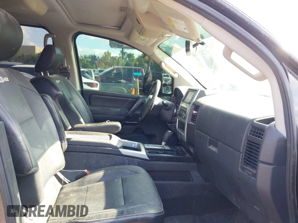 2013 Nissan Titan Pro-4X with VIN 1N6BA0EC4DN305032, listed as a IAAI auction lot 42341681 with 118,251 mi miles and . Bid and sale history available at DreamBid. Image 5.