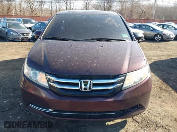 2014 Honda Odyssey EX-L with VIN 5FNRL5H60EB009083, listed as a IAAI auction lot 41633419 with 219,930 mi miles and . Bid and sale history available at carsss.com. Image 12.
