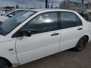 2004 Mitsubishi Lancer ES with VIN JA3AJ26E74U060371, listed as a IAAI auction lot 41636927 with 165,456 mi miles. Bid and sale history available at carsss.com. Image 14.
