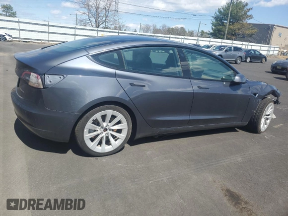 2022 Tesla Model 3 Long Range with VIN 5YJ3E1EBXNF188596, listed as a Copart auction lot 51846915 with 49,271 mi miles and Non Repairable. Bid and sale history available at carsss.com. Image 3.