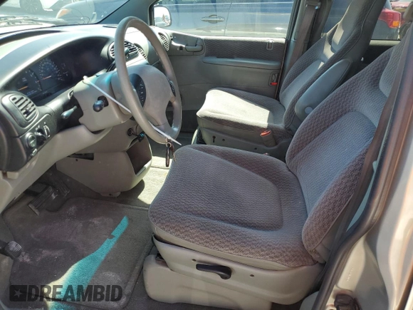 1999 Dodge Caravan SE with VIN 1B4GP44G5XB904043, listed as a Copart auction lot 77331804 with 105,141 mi miles and Clean Title. Bid and sale history available at DreamBid. Image 7.
