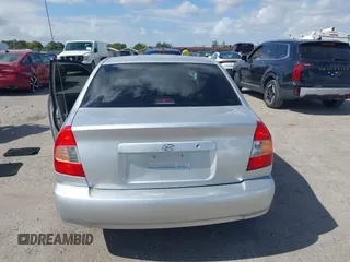2002 Hyundai Accent GL with VIN KMHCG45C82U268756, listed as a IAAI auction lot 41569829 with 89,752 mi miles. Bid and sale history available at carsss.com. Image 16.