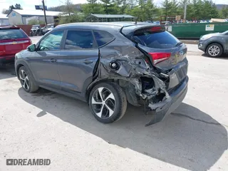 2016 Hyundai Tucson Sport with VIN KM8J33A2XGU022633, listed as a IAAI auction lot 41990348 with 73,395 mi miles. Bid and sale history available at carsss.com. Image 3.