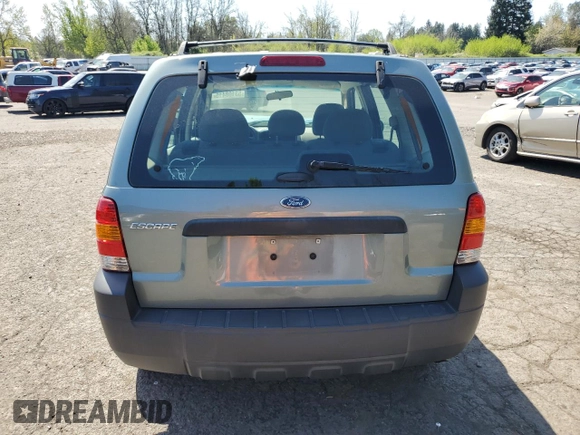 2006 Ford Escape XLS z VIN 1FMYU02Z36KB10195, wystawiony jako Copart lot #53108415 z przebiegiem Nie podano mil oraz Szkoda całkowita • Salvage title. Historia ofert i sprzedaży dostępna na DreamBid. Obrazek 6.
