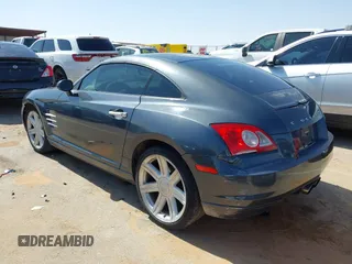 2006 Chrysler Crossfire Limited z VIN 1C3AN69LX6X066596, wystawiony jako IAAI lot #42315568 z przebiegiem 145 180 mil mil oraz . Historia ofert i sprzedaży dostępna na DreamBid. Obrazek 3.